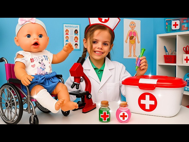 Maya is playing doctor and helping a doll and other toys get better.