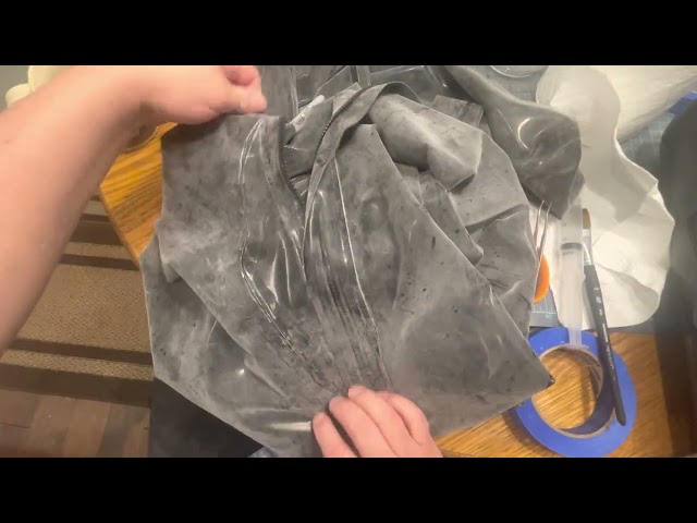 Repair of a large rip in a latex catsuit