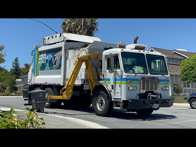 Peterbilt 320 Heil Python garbage truck collecting trash - Recology South Bay