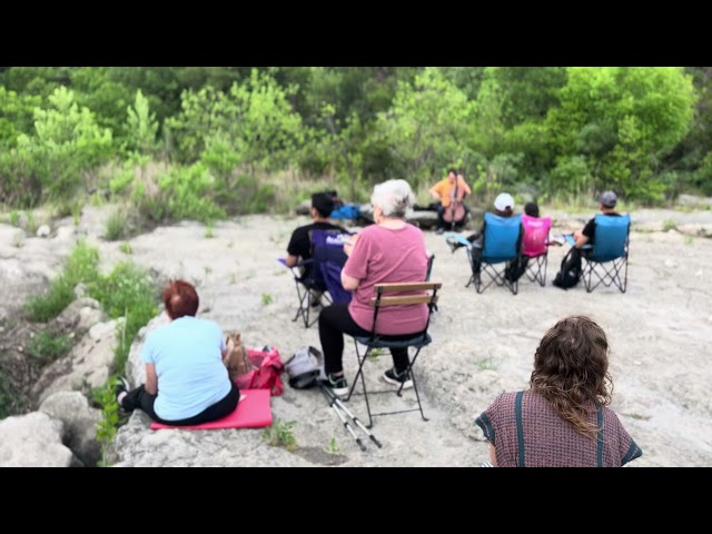 Strings in the Woods Behind the Scenes Audience on the Rocks Listening in Austin Texas