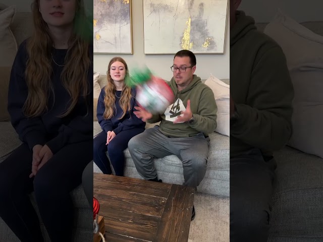 This Saran Wrap Ball Game is the MOST FUN Christmas Party Game!