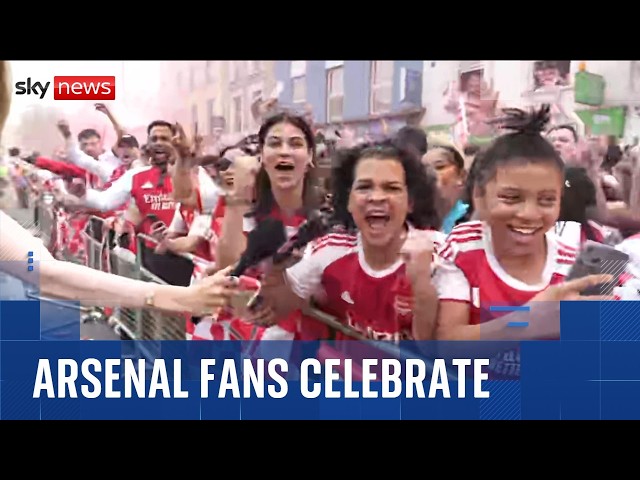 Thousands of Arsenal fans line the streets of North London for Premier League trophy parade