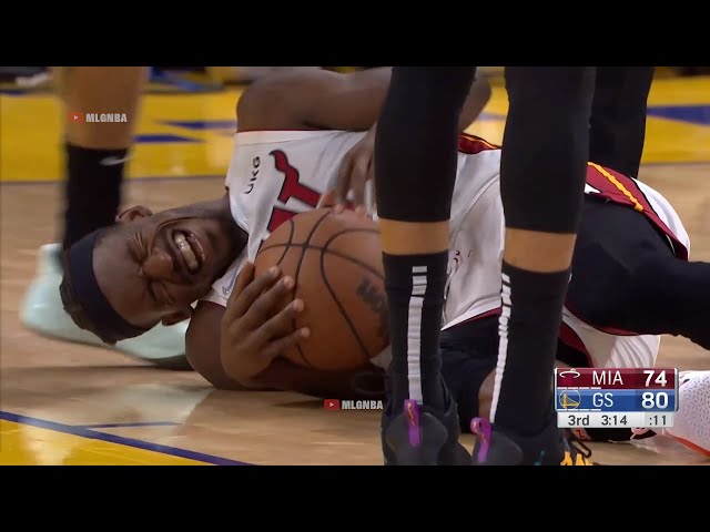 Jimmy Butler just was carried off the court after suffering a right ankle injury 👀