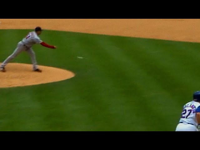 Pitcher Julian Tavarez rolls it to first to record the out!