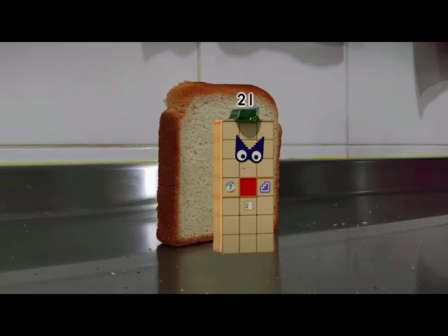 Bread falling over the Number Explorer (Numberblock 21)