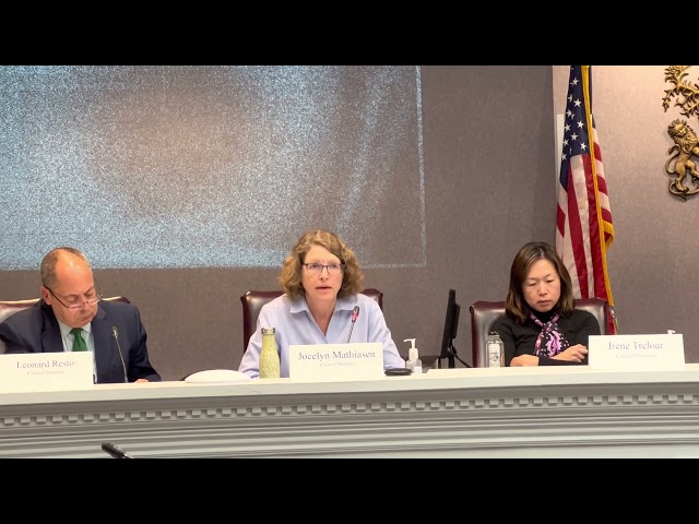 Council member Jocelyn Mathiasen explains the automated garbage collection