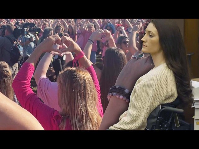Lindsay Clancy Greeted By Crowd Of Supporters Wearing Pink