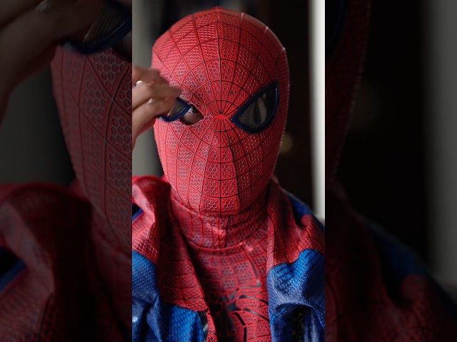 Putting on Spider-Man Mask