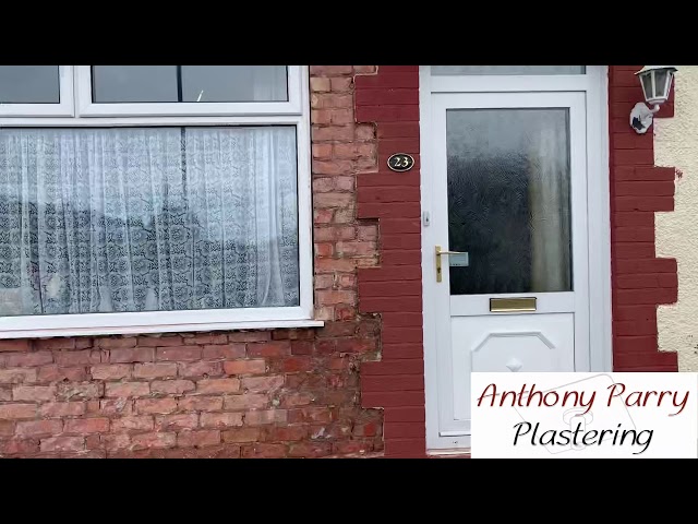 Pebbledashing a bungalow. Time lapse Black and White Spar