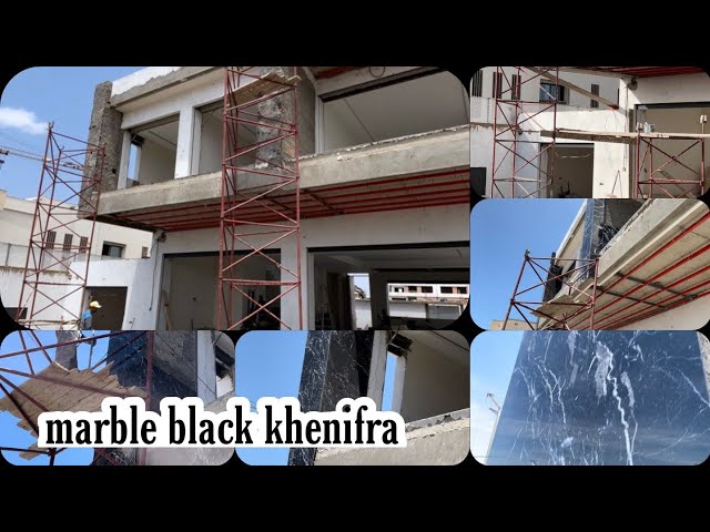Installation of black marble on two columns for the facade of the villa