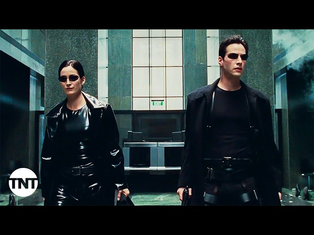 Neo and Trinity Have a Shootout in the Lobby [CLIP] | The Matrix | TNT