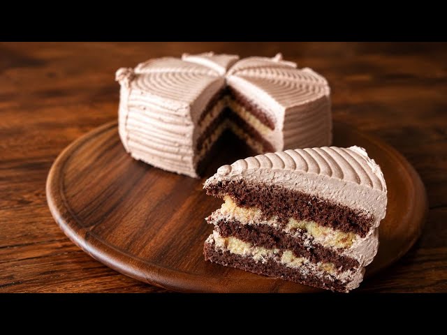 Chocolatey, rich, and moist German Chocolate Cake layered with creamy coconut and pecan filling. 🍫🥥✨