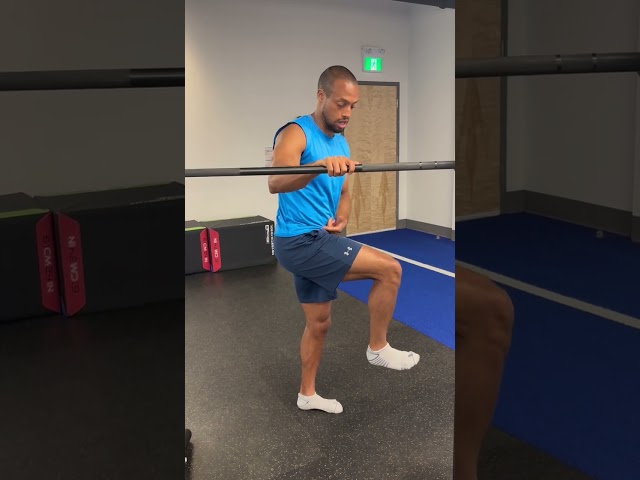 Wall or bar assisted one leg knee drive with pivot outward