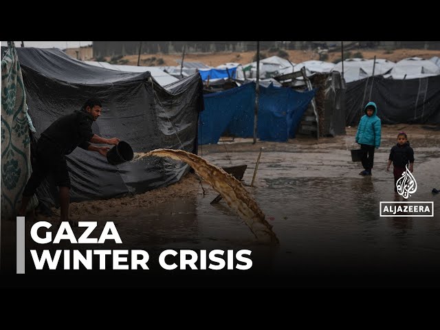 Storm worsens living conditions: A families dig trenches to keep water out of tents