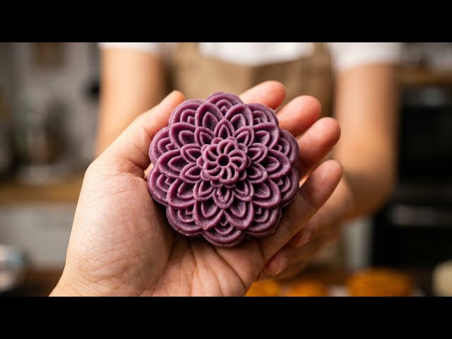 Shaping taro cakes in the style of mooncakes.