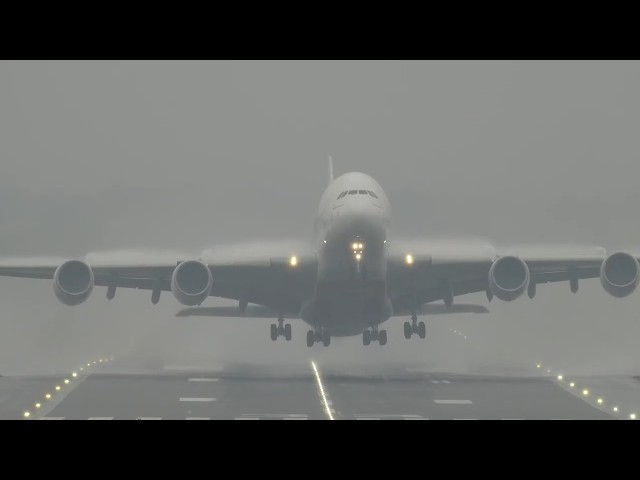 The worlds biggest passenger plane Airbus A380 vs WET RUNWAY at Birmingham Airport BHX