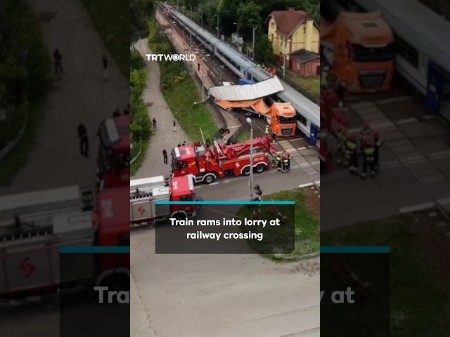 Train crashes into lorry stuck at railway crossing in Poland