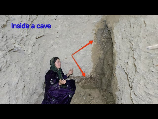Un manantial milagroso brota de una cueva mágica: una mujer nómada rebosante de alegría.