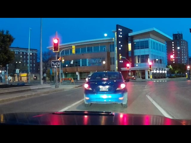 Cop makes left turn on red light