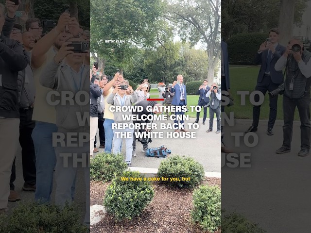 Crowd gathers to welcome CNN reporter back to the White House