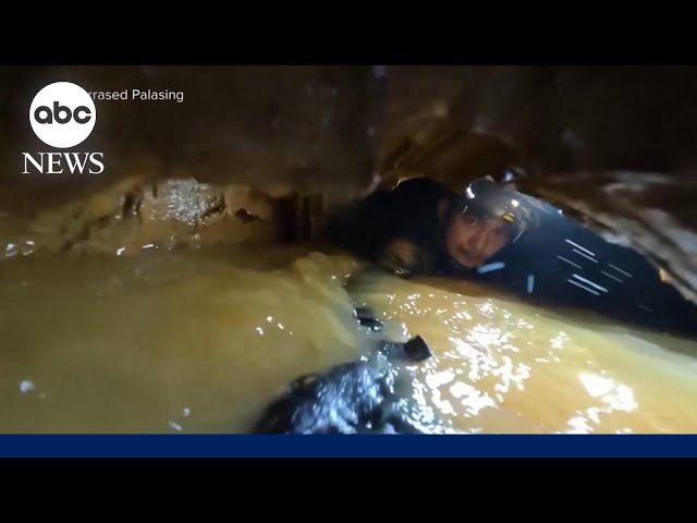 Laos cave rescuers hear 'knocking' in race to find last two trapped villagers