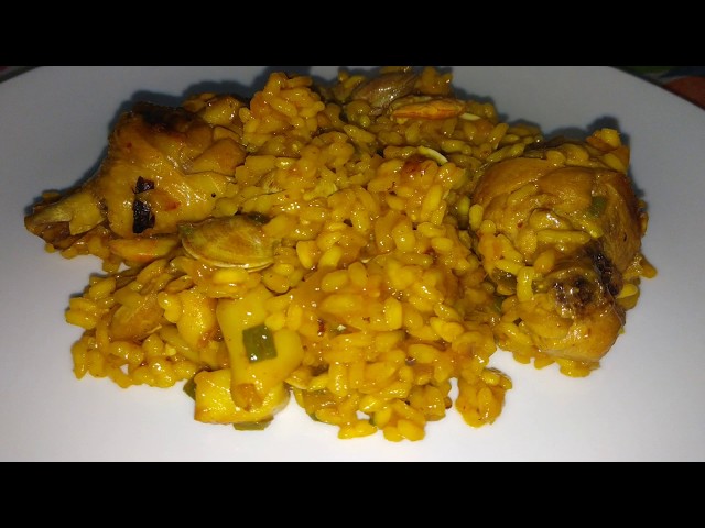 PAELLA ESPAÑOLA mixta, pollo y marisco