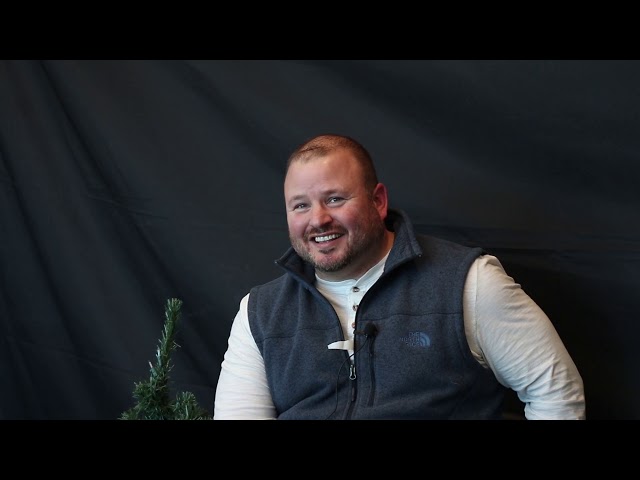 Between Two Trees (Christmas) Brian - Director of Digital Marketing