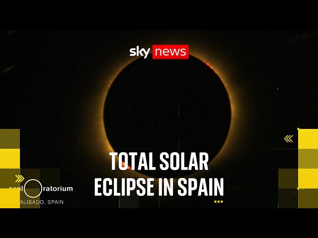 Beachgoers in Spain in awe at total solar eclipse
