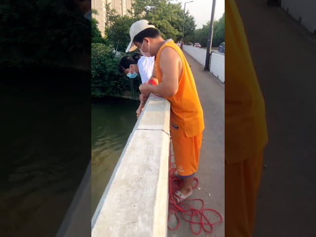 This boy caught a lot of fish in his net. #shortvideo
