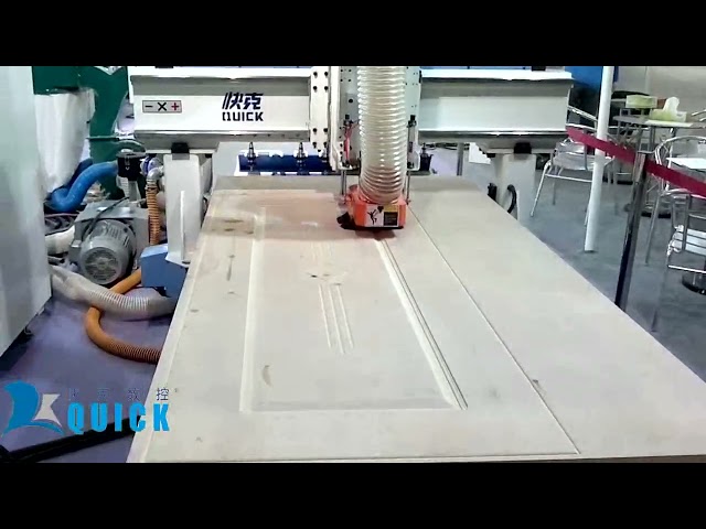 UA 481 linear ATC cnc router working on wood door