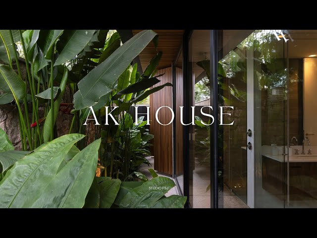 Single Floor Minimalist House Design With A Tropical Garden Creates A Comfortable & Welcoming Spaces
