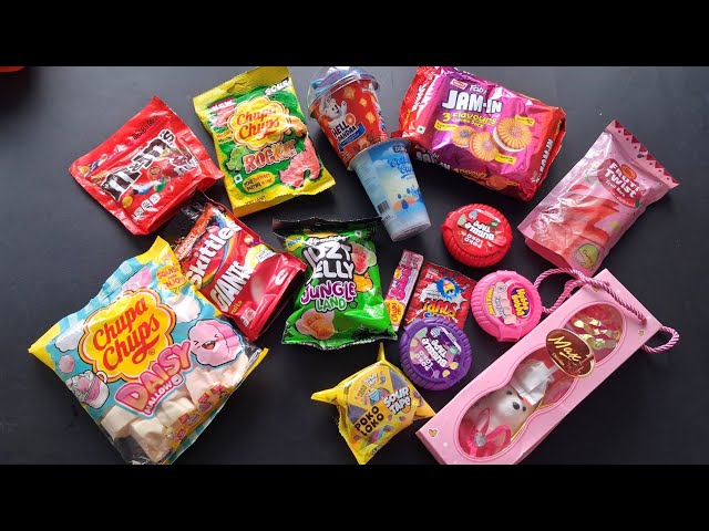 100 candies opening, chocolate a video, lots of chocolates, Cadbury celebration, surprise toys