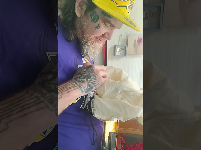 Reticulated python unboxing part1 this is the male he is purple albino double het anery/pied