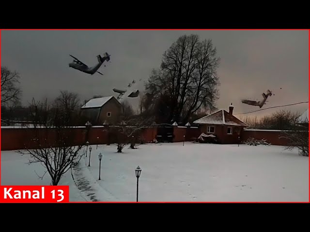 The moment a Russian An-22 military plane crashed - plane broke apart in mid-air and hit the ground