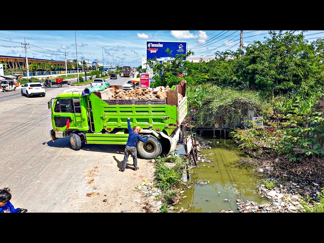 Start a new project!! Filling Land By Dump Truck Unloading Soil with Bulldozer