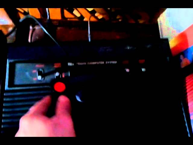 Atari 2600 replica video game console with 64 exciting games