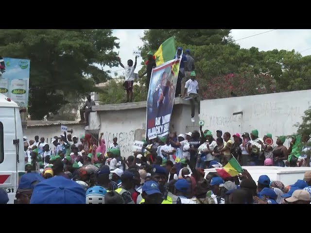 Supporters of ex-Senegal president Macky Sall gather in Dakar to welcome him | AFP