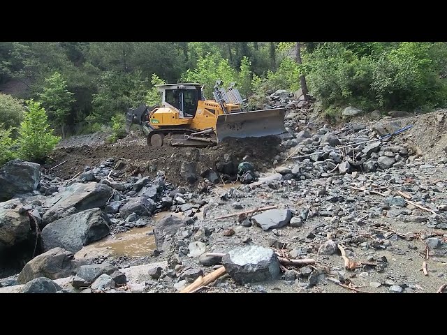 BULLDOZER IN ROCKY FOREST AREA UNSTOPPABLE FOREST ROAD CONSTRUCTION #working #bulldozer #work