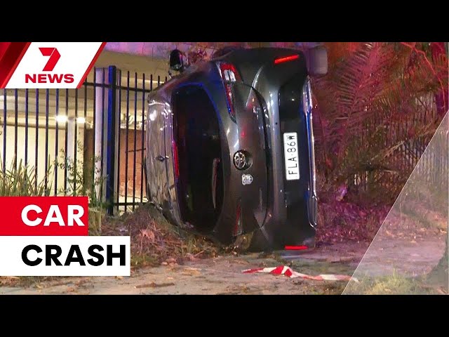 Car flips in Greenacre | 7NEWS