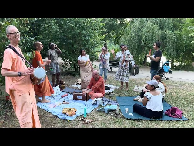 Madhurpati Prabhu Chants the Final Hare Krishna Kirtan in a Lyon Park and People Dance