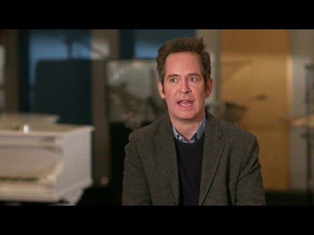 BOHEMIAN RHAPSODY "Jim Beach" Tom Hollander Behind The Scenes Interview