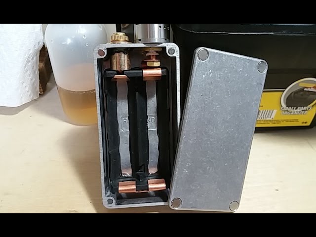 Custom fully mechanical dual 18650 series box mod