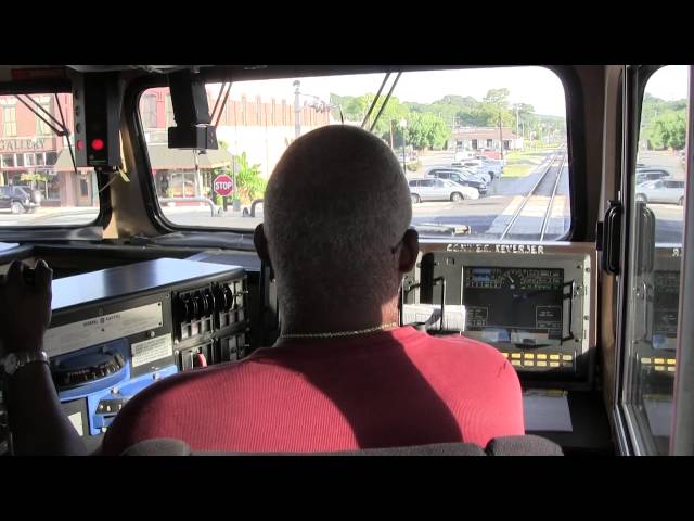 Locomotive Engineer Mike Barnett  (Multiple Grade Crossings) as prescribed by law and operating rule