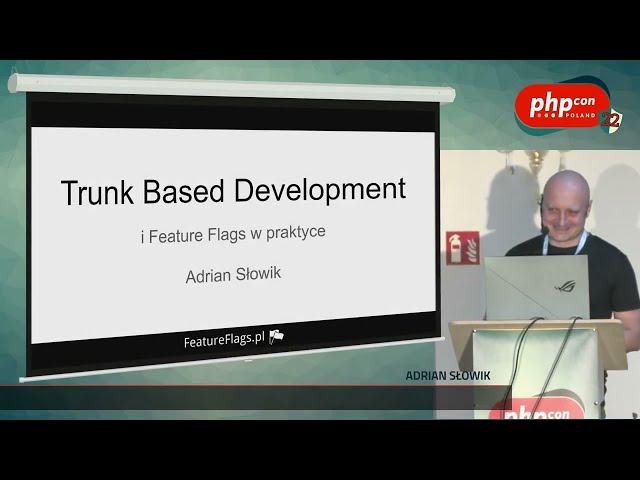 Adrian Słowik: Trunk Based Development i feature flags w praktyce @PHPcon Poland 2022