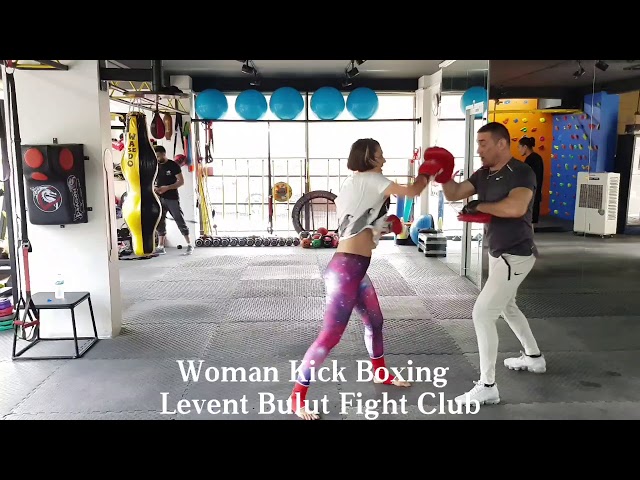 Levent Bulut Fight Club woman kick boxing pad work
