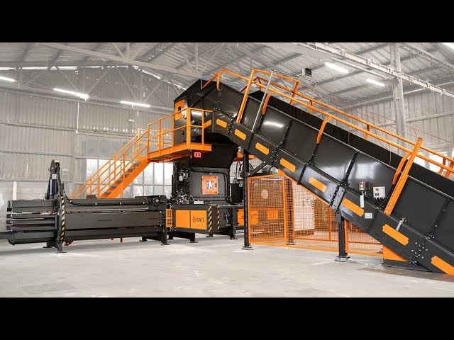 ANIS channel waste baler with feeding conveyor. Model: ATS110-75S-4H