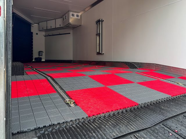Caliber - ProTech Flooring // Rover Off-Road Trailer Install