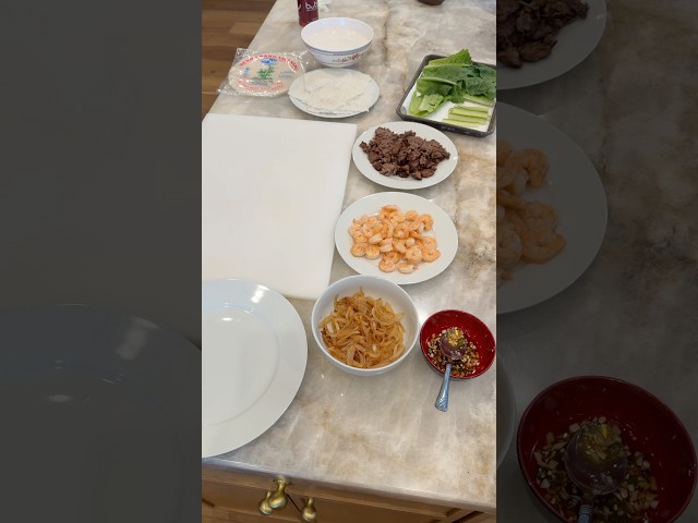 Making spring rolls for my toughest food critics