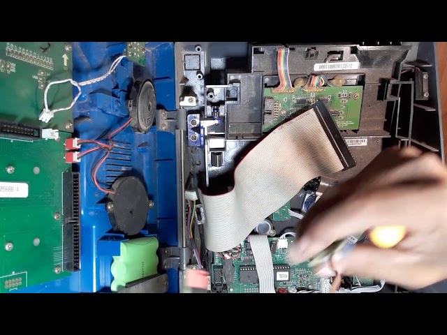Reciclado de componentes electronicos de un telefono monedero y control con Arduino uno - Extracción