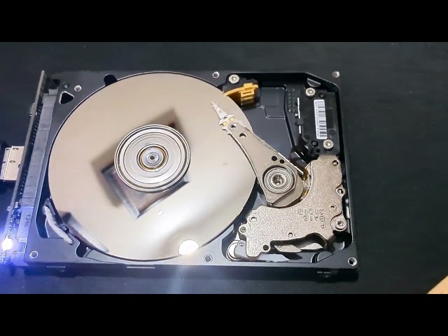 The insides of a Spinning HDD